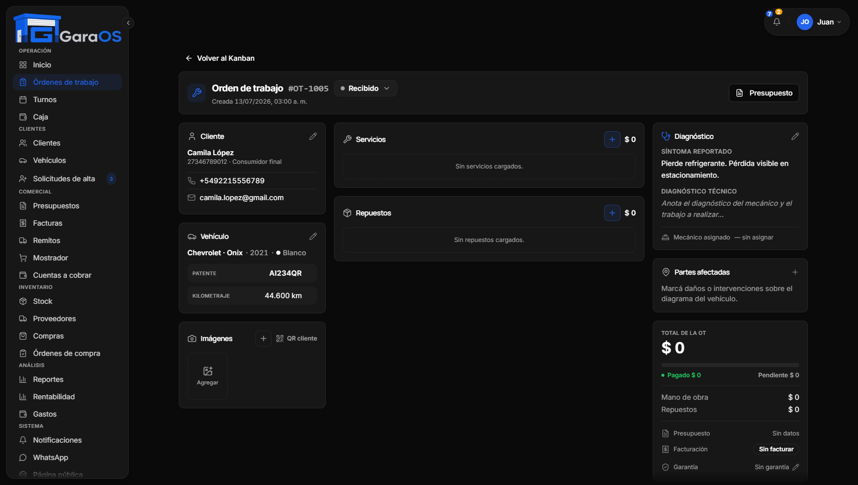 Detalle de una orden de trabajo en GaraOS: cliente, vehículo, servicios y repuestos