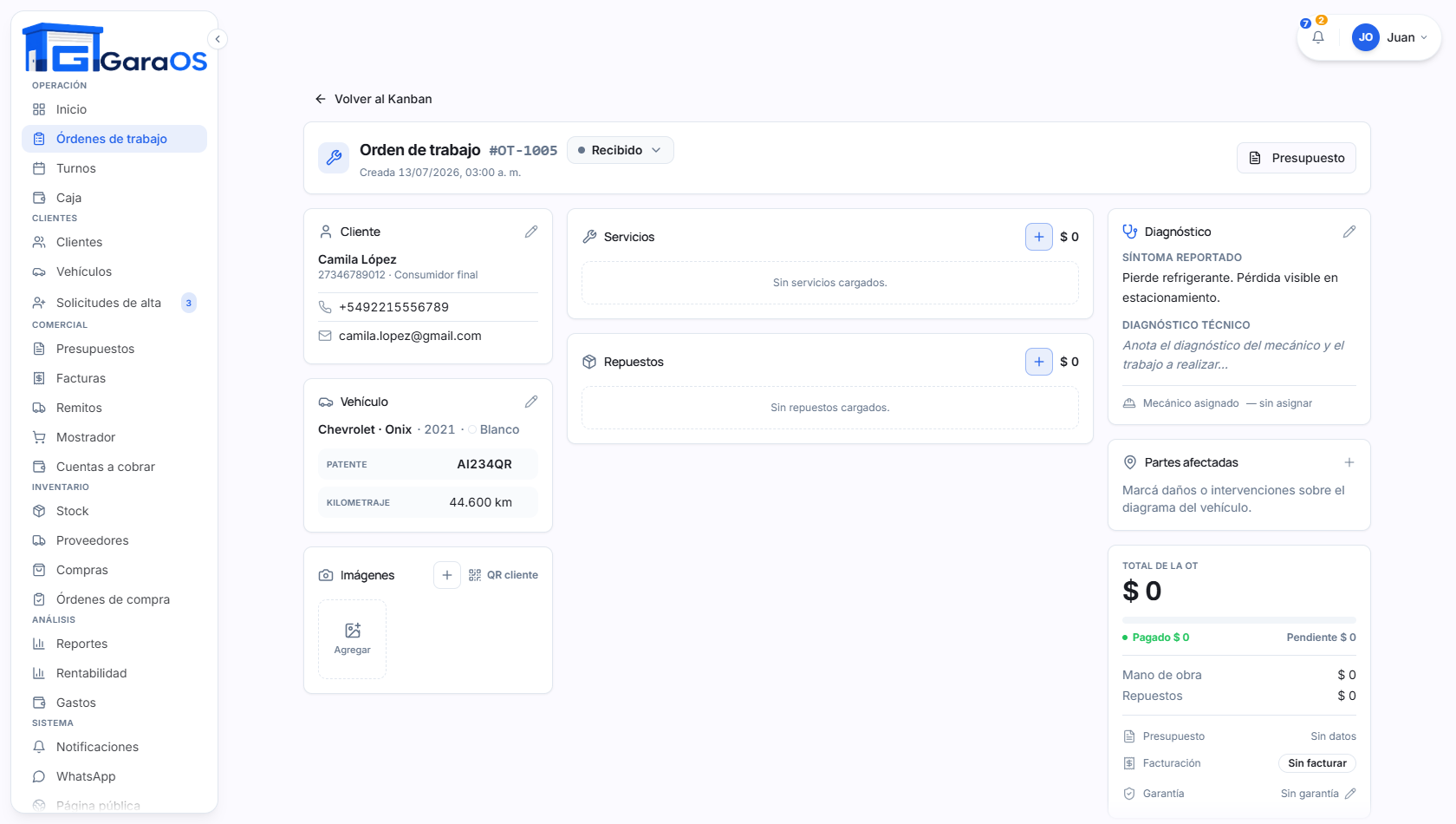 Detalle de una orden de trabajo en GaraOS: cliente, vehículo, servicios y repuestos